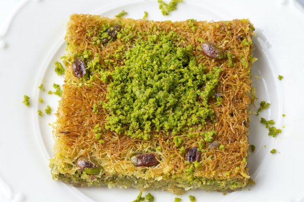 Quali sono i passaggi per una parmigiana di carciofi con scamorza affumicata?